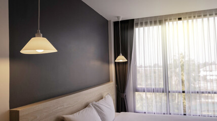 Bedroom comfortable interior design in the morning, Compact hotel room with facility accomodation