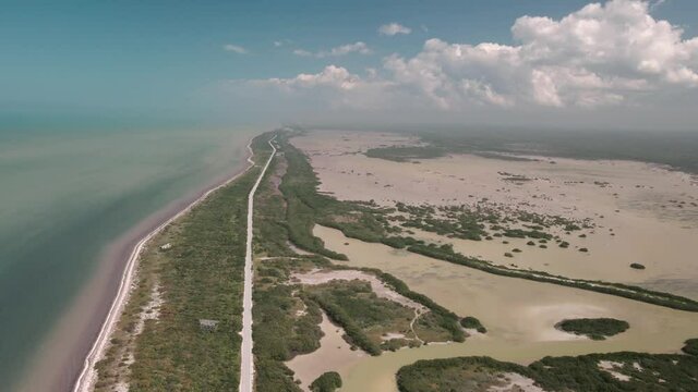 Drone vie wof the road inside the manrgove of Yucatan