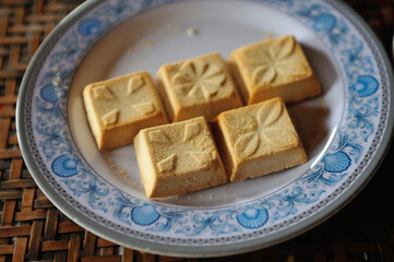 Kuih Bangkit (Sago Cookies) on a  palte.