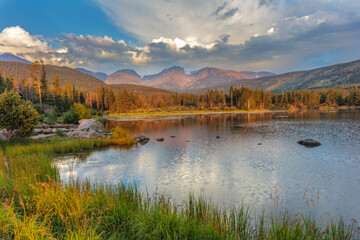 Sunrise on Hallett Peak and Flattop Mountain above Sprague Lake in Rocky Mountain National Park, Colorado, USA