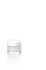 Cosmetic cream for skin, face and body care and hygiene. In glass jar on white background. Copy space.