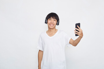 man wearing headphones from a smartphone