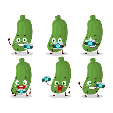 Photographer profession emoticon with zucchini cartoon character