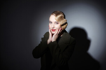 portrait of an attractive blonde with a retro hairstyle