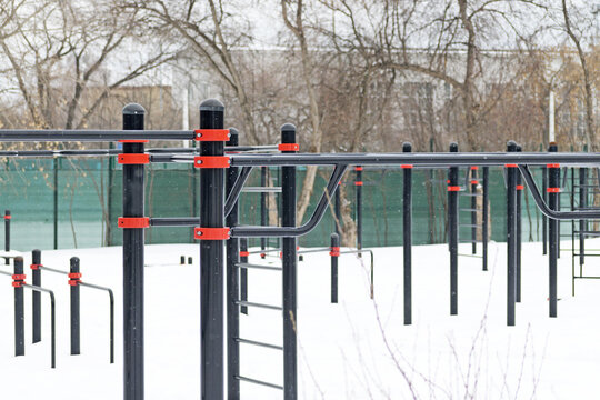 Metal bars for outdoor sports field exercises