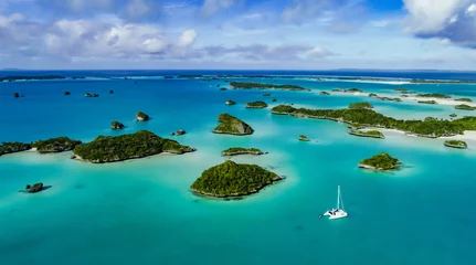  A spectacular  drone  image over Falaga Island in the lower Lau Group, Fiji showing a catamaran peacefully at anchor. © tazdevilgreg