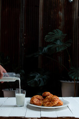 Croissant on wooden tabel background