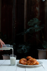 Croissant on wooden tabel background