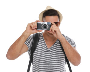 Man with straw hat taking picture on white background. Summer travel