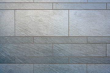 Background from a wall made of gray granite slabs