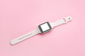 Modern smart watch on color background