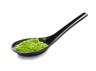 Spoon with powdered matcha tea on white background