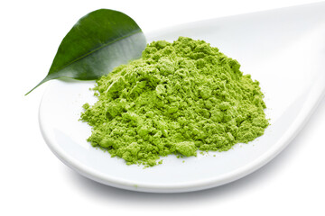 Bowl with powdered matcha tea on white background