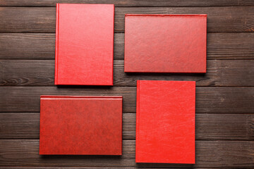 Blank books on wooden background