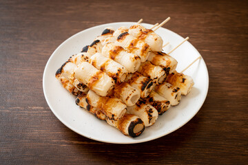 grilled tube shaped fish paste cake skewe or tube squid skewer