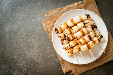 grilled tube shaped fish paste cake skewe or tube squid skewer