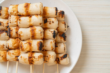 grilled tube shaped fish paste cake skewe or tube squid skewer
