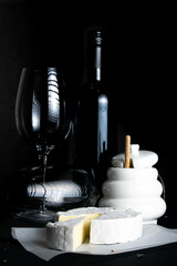 Wine, glasses, blue cheese and honey