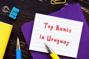  Financial concept about Top Banks in Uruguay with inscription on the piece of paper.