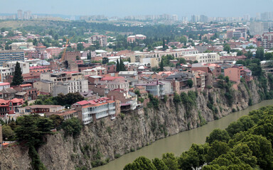 beautiful view of Tbilisi, Georgia. The Kura River. Colored houses of the city. © YulianaK