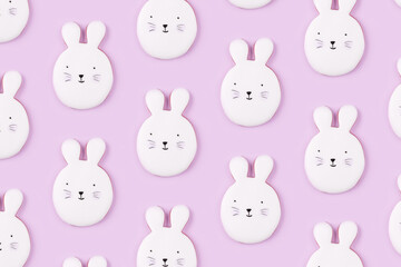 Easter bunny cookies on lilac background. Spring holiday.