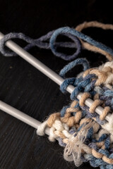 Photo of colored balls from knitting yarn. Knitting supplies close-up. Knitting-women's needlework.