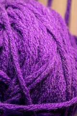 Photo of colored balls from knitting yarn. Knitting supplies close-up. Knitting-women's needlework.