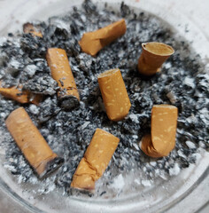 Ashtray full of cigarettes butts 