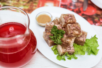 jellied meat with mustard with herbs