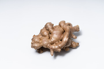 Fresh ginger on white background