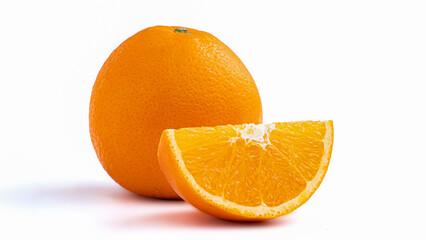 Cut in half and slice a ripe orange fruit with golden yellow peel. Isolated on white background...