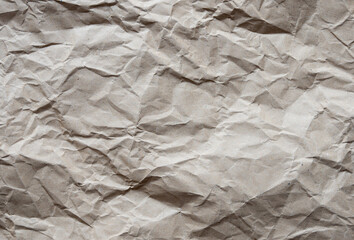 Paper texture background of brown crumpled recycled cardboard paper sheet - 418264826
