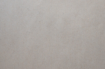 Brown paper texture background of paperboard sheet.