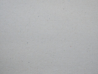 Recycled paper texture background of paperboard sheet.