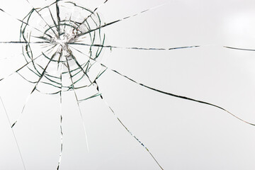 Cracks on the glass on a white background.
