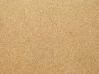 Brown paper texture background of paperboard sheet.