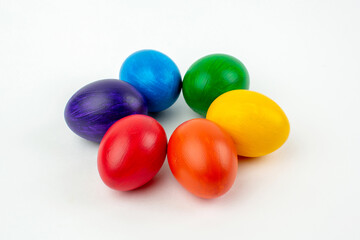 Fototapeta na wymiar Multicolored eggs on white background