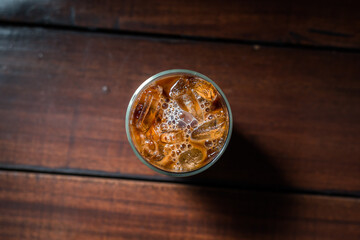 glass of iced coffee with milk on the table