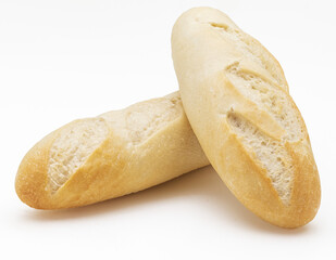 Crisp loaves of freshly made white bread. Isolated on white background.