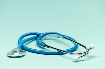 Medical stethoscope isolated on blue background. stethoscope is an important diagnostic tool for doctor. listening to the lungs for inflammation. Copy space