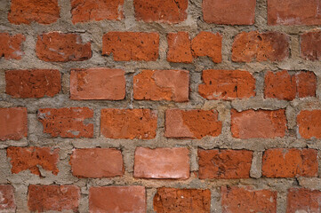 Old red brick wall close up