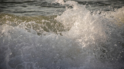 Sea wave close-up. Sea foam.