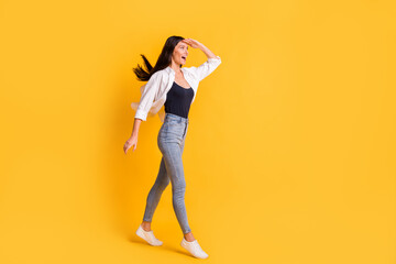 Full body profile photo of impressed person hand on forehead look empty space isolated on yellow color background