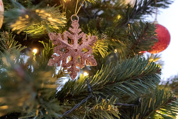 star christmas decoration detail placed on tree