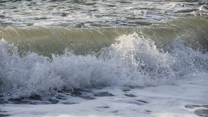 Sea wave close-up. Sea foam.