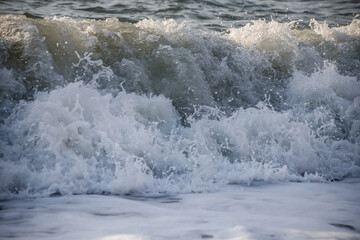 Sea wave close-up. Sea foam. Water spray
