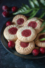 Biscuits with berry jam on a plate