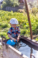 the child waters the garden helps parents