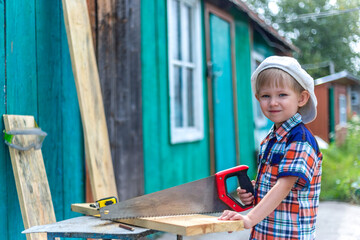a small child helps cut otsu boards