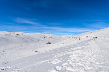 Fototapeta na wymiar Malga San Giorgio Ski Resort in winter with snow. Lessinia Plateau (Altopiano della Lessinia), Regional Natural Park, Bosco Chiesanuova Municipality, Verona province, Veneto, Italy, Europe.